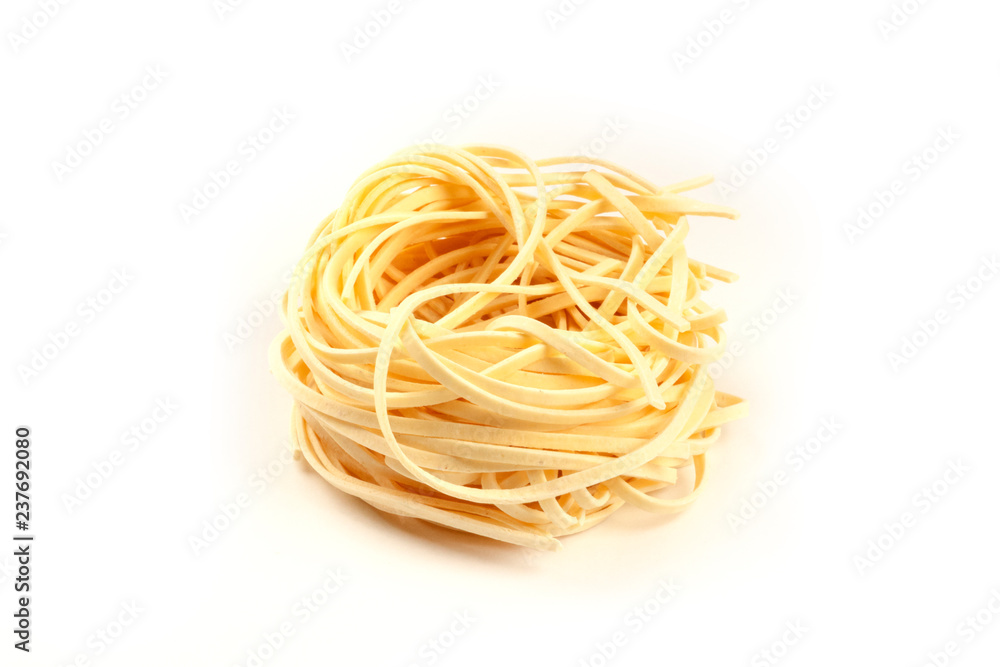 A photo of udon noodles in the form of a nest on a white background with a place for text A photo of udon noodles in the form of a nest on a white background with a place for text