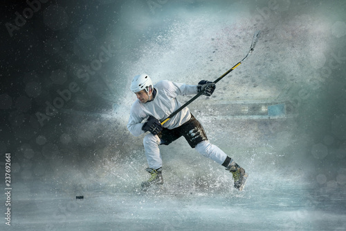 Fototapet ice hockey Players in dynamic action in a professional