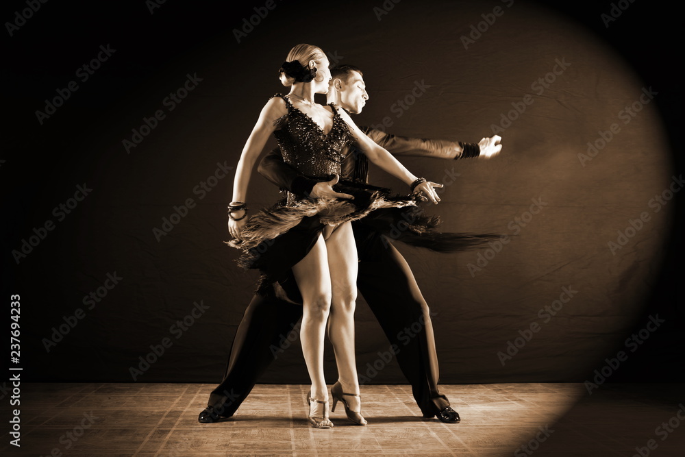 dancers in ballroom isolated on black background dancers in ballroom isolated on black background