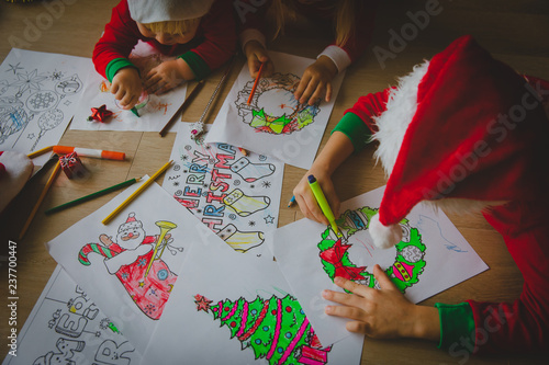 kids making Christmas crafts, draw and colour