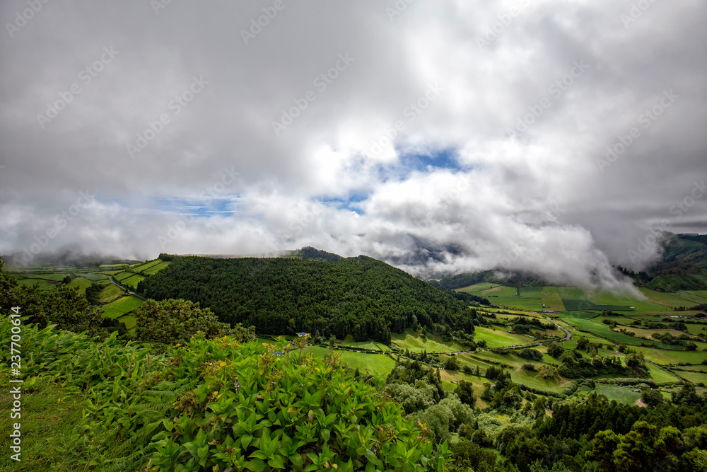 A dramatic cloud show above the Sete Cidades caldera in Sao Miguel, Azores.