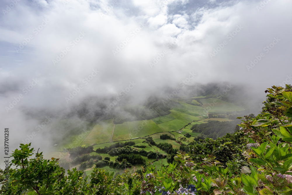 Fototapeta premium Beautiful pastures from the rim of Sete Cidades caldera in Sao Miguel.