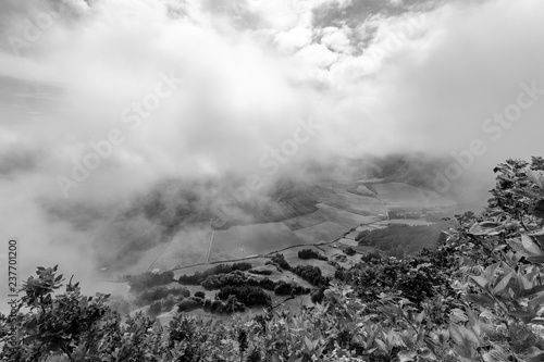 Black and white view of Pastures in the Sete Cidades caldera from the rim in Sao Miguel.