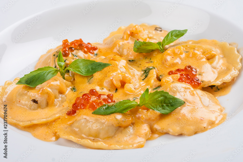 Ravioli with salmon on white background Ravioli with salmon on white background