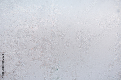 Background ice on the glass. Frost. The texture of frost. The glass is frozen.