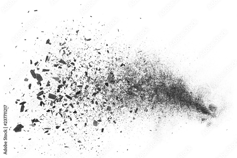 Black charcoal dust, gunpowder explosion isolated on white background and texture, top view Black charcoal dust, gunpowder explosion isolated on white background and texture, top view