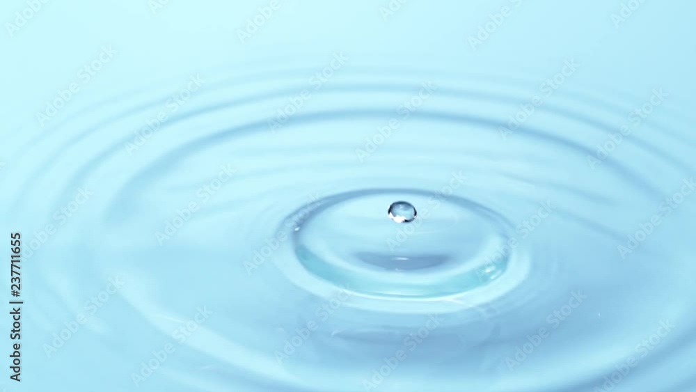 Super slow motion of splashing water drops, filmed on high speed cinema camera Super slow motion of splashing water drops, filmed on high speed cinema camera