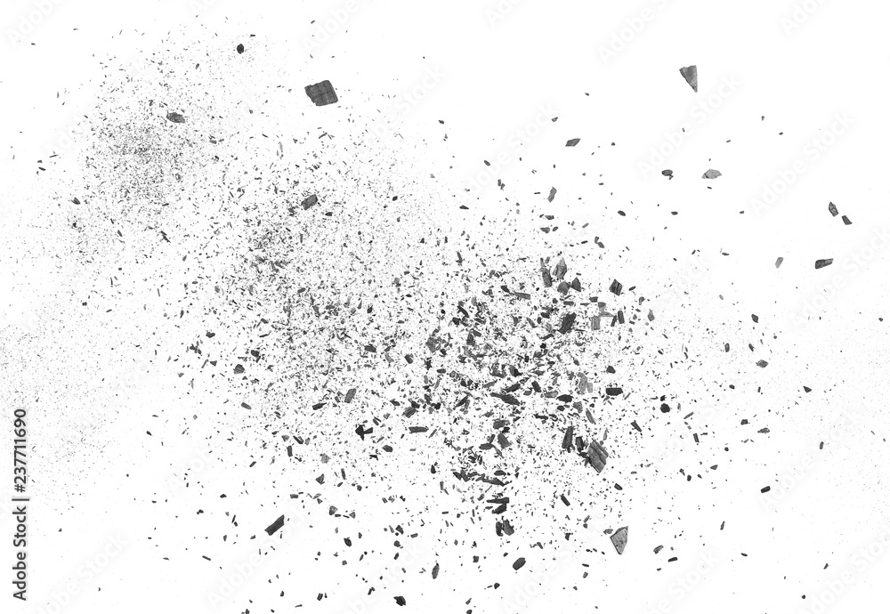 Obraz premium Black charcoal dust, gunpowder explosion isolated on white background and texture, top view