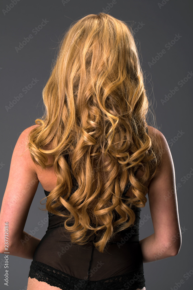 Fototapeta premium Female Long wavy blonde hair