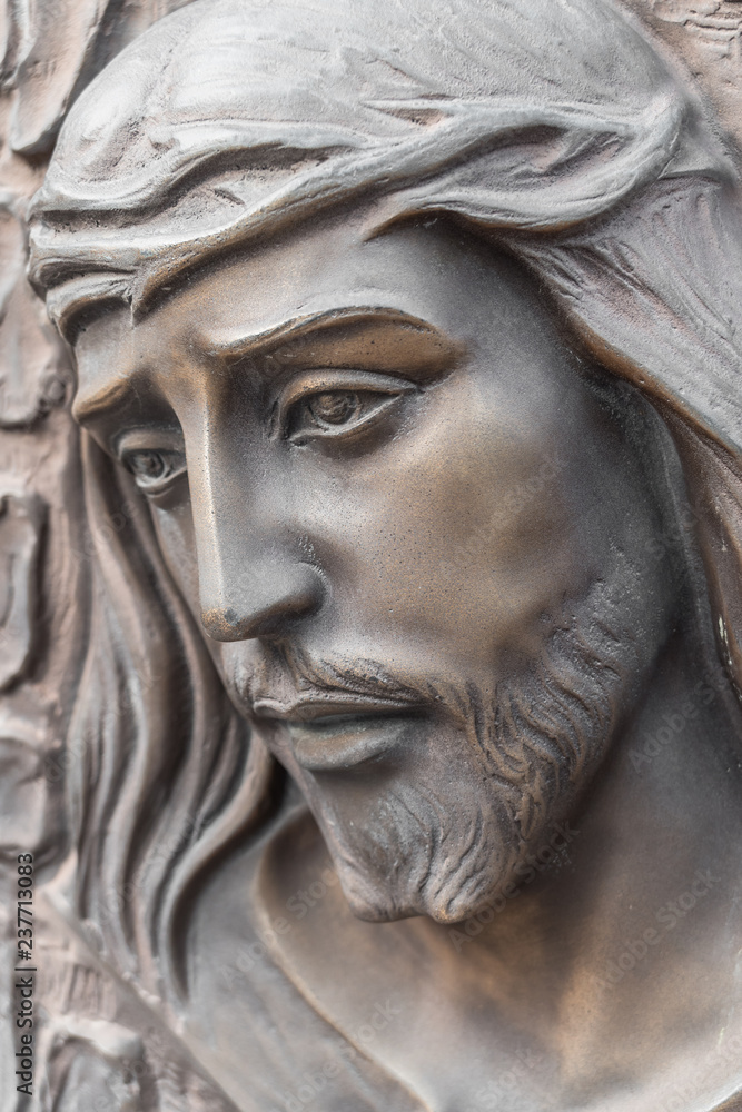 Bronze statue of the face of jesus