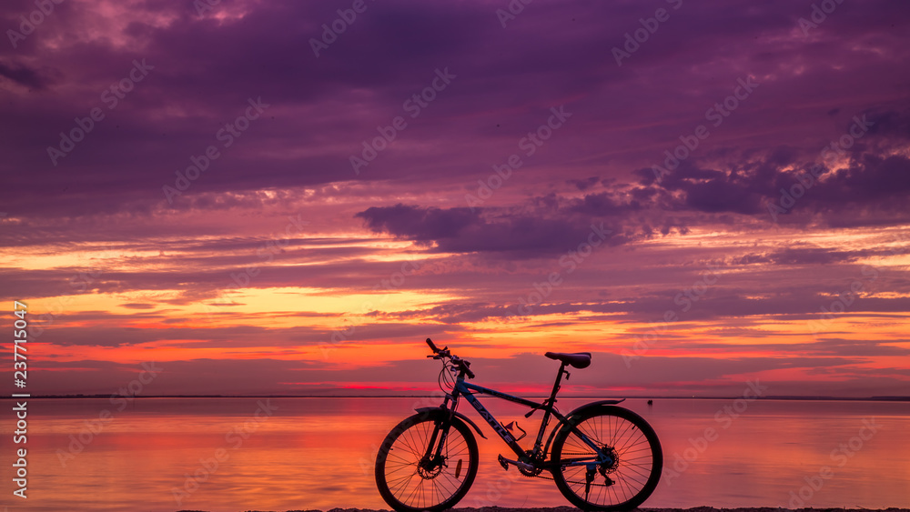 silhouette of bicycle on sunset