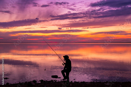 fishing at sunset © Askhat