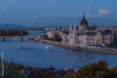 Budapest Parliament building, in the early evening, overlooking the river Danube. © parkerspics