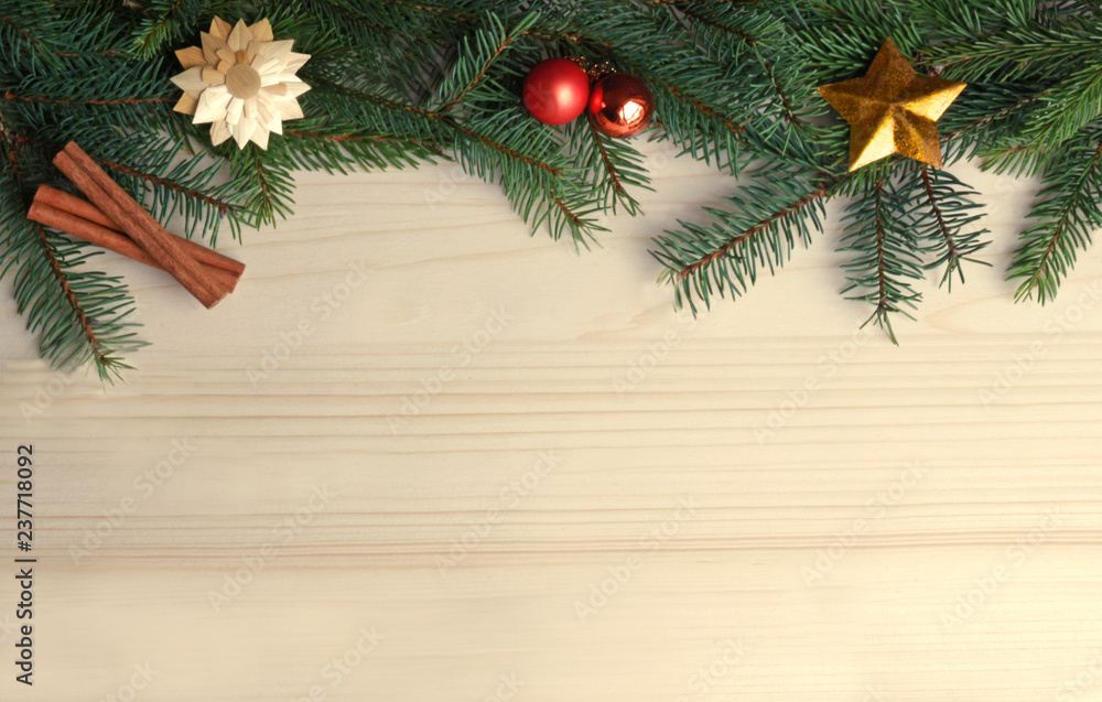 green christmas frame with fir branches on bright wood green christmas frame with fir branches on bright wood