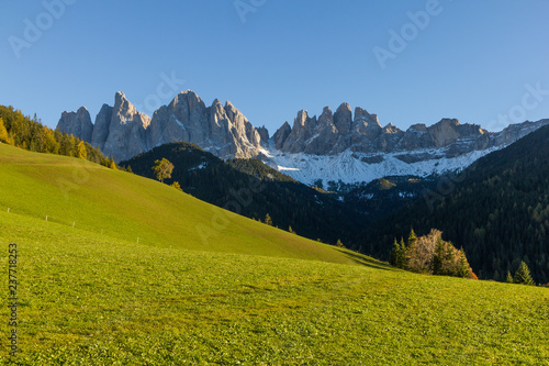 Mountain meadows, big mountains, rocky peaks, sunshine, blue sky. Perfect place to relax and unwind. Quiet, fresh air, amazing views. Great place for holidays any time of the year. © janstria