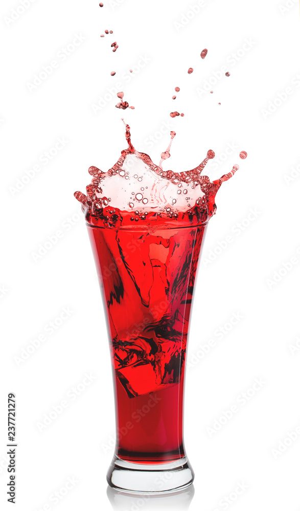 Splash of fragrant natural juice in high transparent glass Splash of fragrant natural juice in high transparent glass