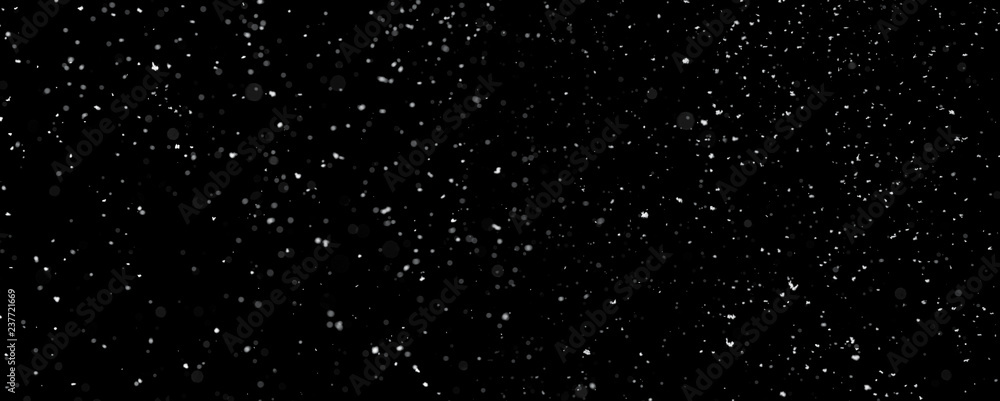 Fototapeta premium Panoramic snowfall isolated on black background with copy space