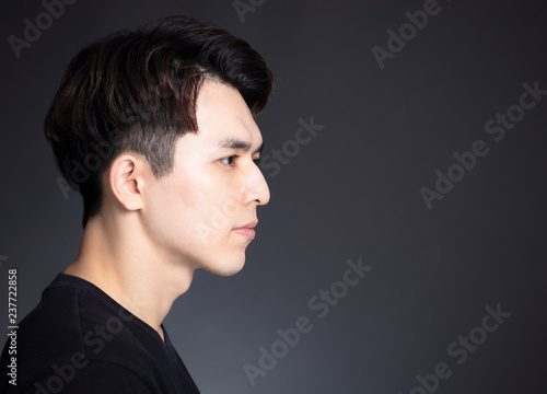 Side view of young handsome man face