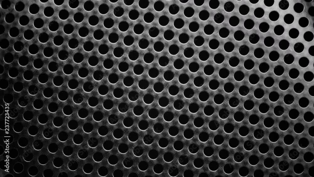 Rotated perforated steel surface background.
Rotated perforated steel surface background.
