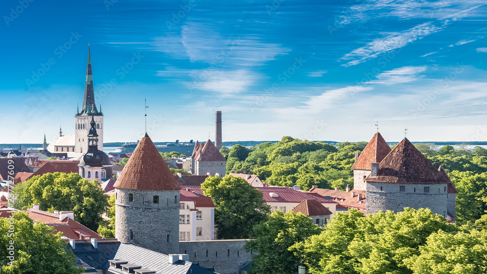 Tallinn in Estonia, panorama of the medieval city with Saint-Nicolas church, colorful houses and typical towers 