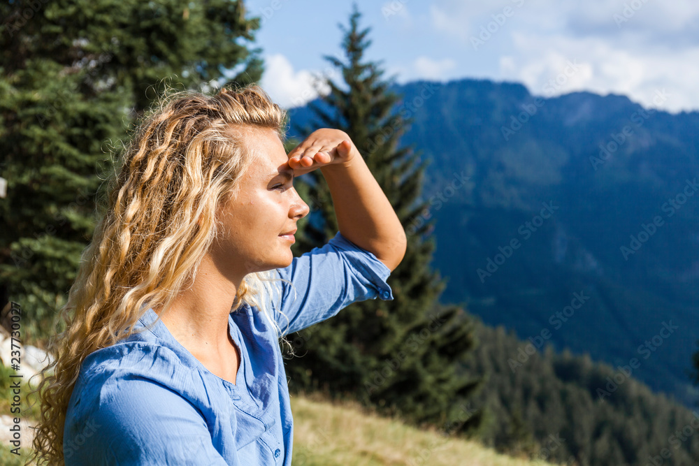 Germany, Bavaria, Oberammergau, young woman on a hiking trip looking at view Germany, Bavaria, Oberammergau, young woman on a hiking trip looking at view