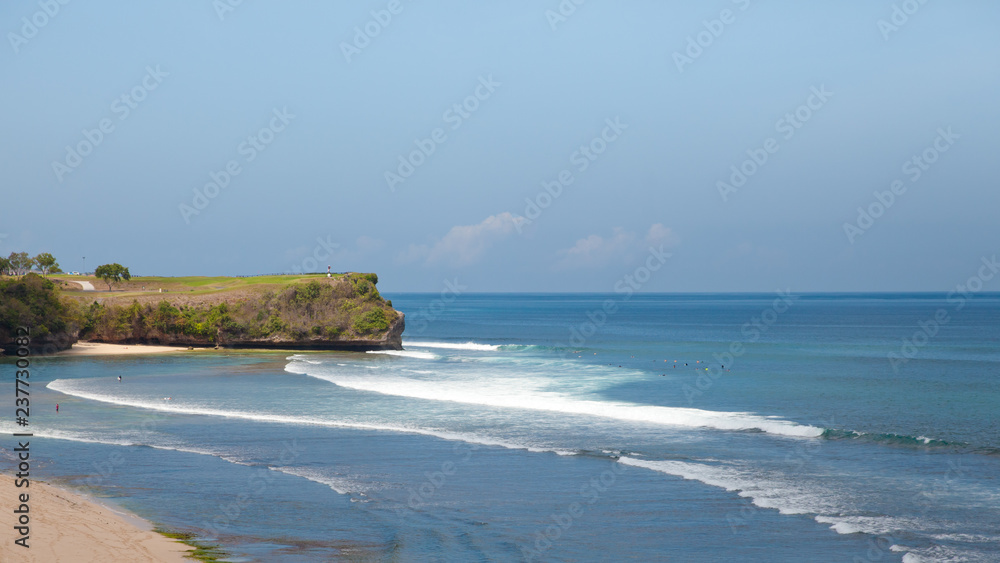 White sand beach, top view. Kuta city, Bali island.