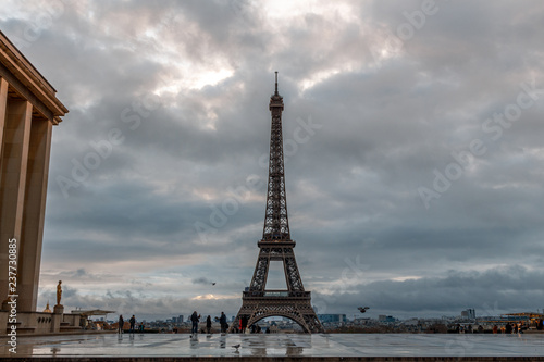 Eiffel Tower in the morning against a cloudy sky in winter