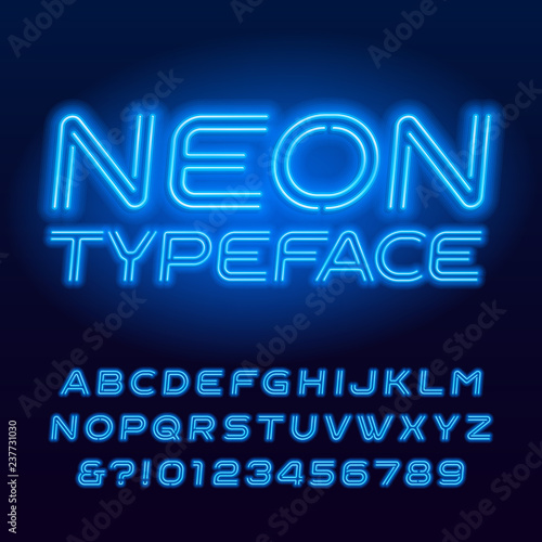 Blue neon tube alphabet typeface. Neon color oblique letters and numbers. Stock vector font for your design.