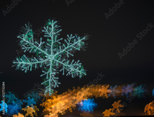 snowflake on colorful bokeh background  snowflake with blurred background.