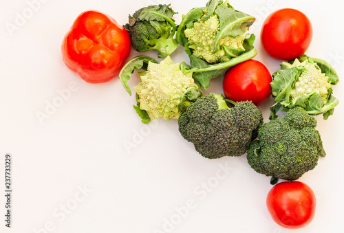 Vegetable variety on wooden white table. Selection of summer and autumn vegetables  space for text