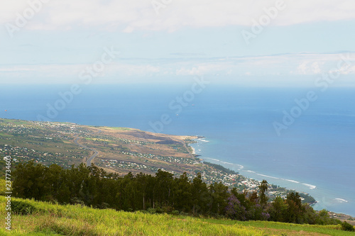 Aerial view over the Indian ocean coast at Les Colimatons Les Hauts at Reunion island, French overseas. photo