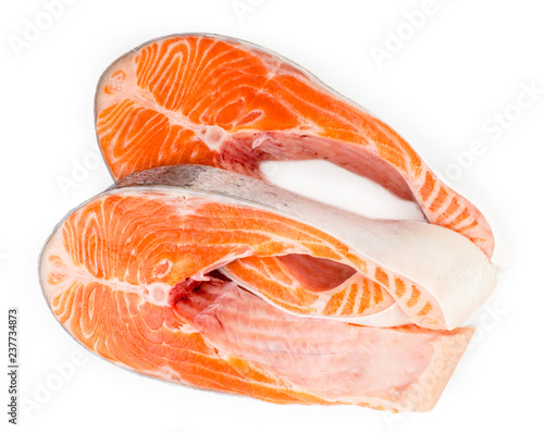 Two pieces of fresh trout on a white, isolated.
