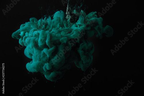 abstract dark wallpaper with green splash of paint