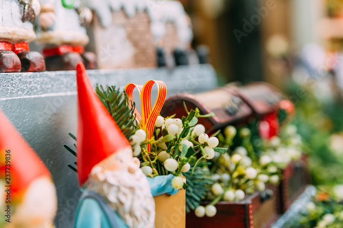 Photography traditional spanish flags colors in christmas market among decorations in winter