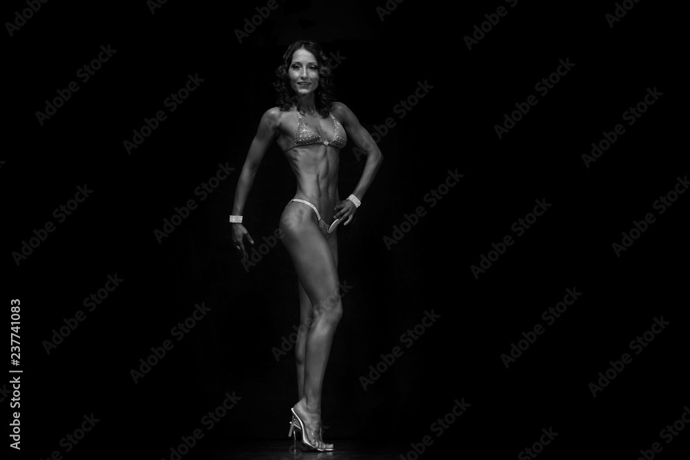 tanned muscular fitness model in bikini tanned muscular fitness model in bikini