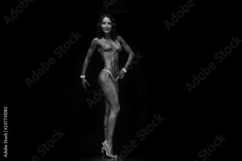 tanned muscular fitness model in bikini © zhagunov_a