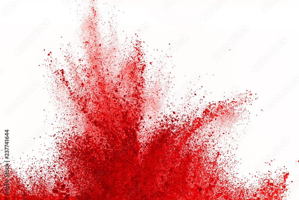 Freeze motion of red powder exploding, isolated on white background. Abstract design of red dust cloud. Particles explosion screen saver, wallpaper