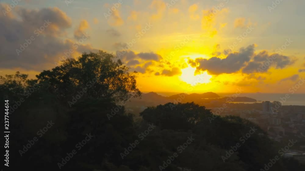 yellow sky during sunrise above Khao Rang viewpoint Phuket. yellow sky during sunrise above Khao Rang viewpoint Phuket.