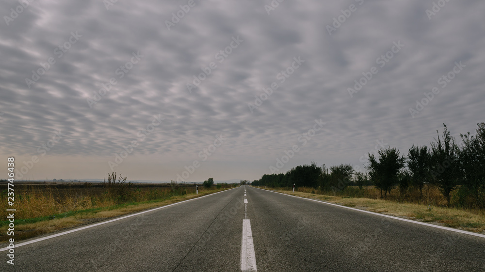 Clouds above the empty road