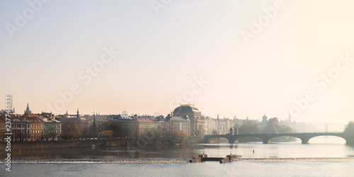 View for embankment of the Vltava River from Karlov most, Charles bridge, in a sunny day, Prague, Czech Republic