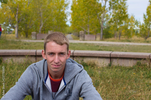 Young man looking unimpressed