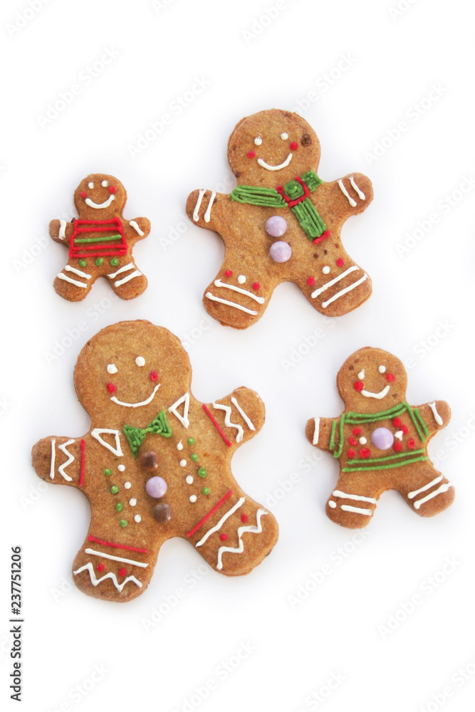 Gingerbread men cookies  isolated on white background with selective focus. Christmas background
