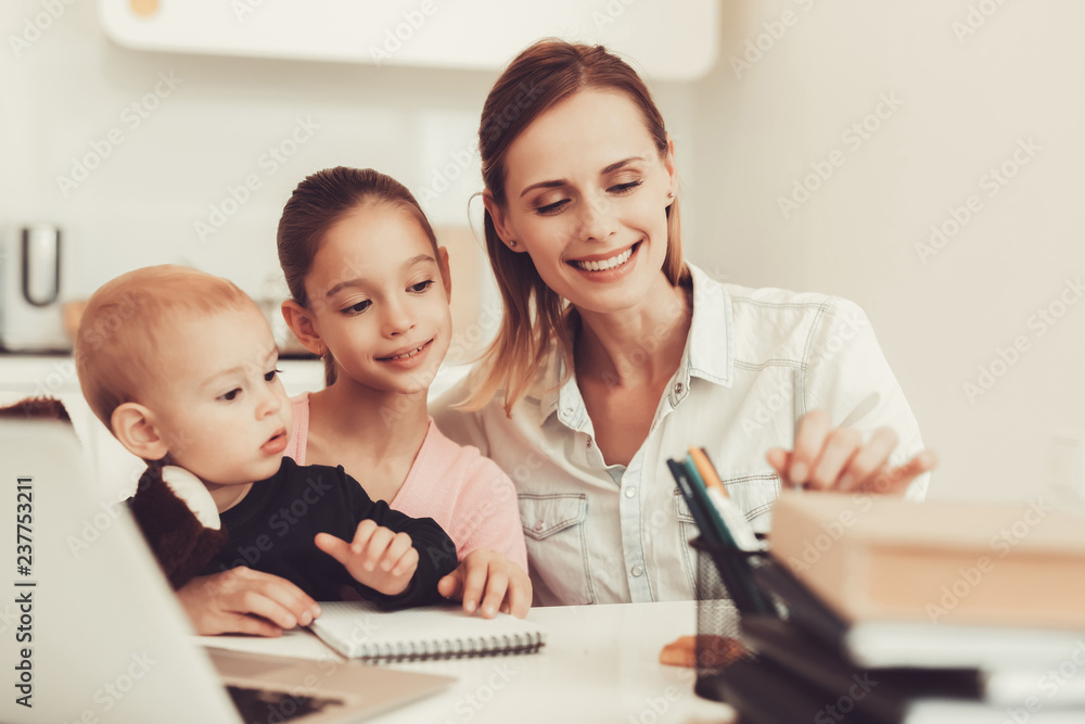 Mom And Daughter Are Playing With Little Baby. Mom And Daughter Are Playing With Little Baby.