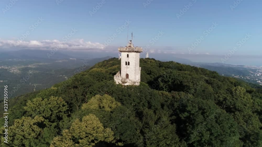 The observation tower on mount Ahun is a landmark of the city of Sochi. Aerial photography with quadrocopter. Panoramic view of the big Sochi. Mountains, forest, sea. View of Adler, Krasnaya Polyana. The observation tower on mount Ahun is a landmark of the city of Sochi. Aerial photography with quadrocopter. Panoramic view of the big Sochi. Mountains, forest, sea. View of Adler, Krasnaya Polyana.