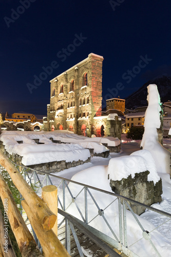 View of the Roman Amphitheatre in center of Aosta, Italy. photo