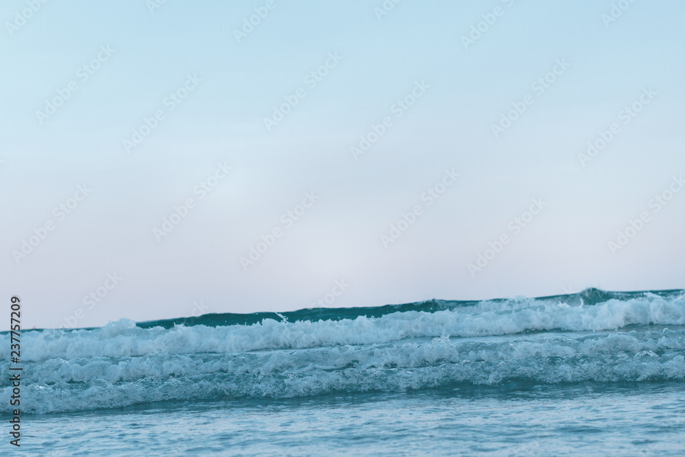 Fototapeta premium Beautiful sky and sea wave at sunset