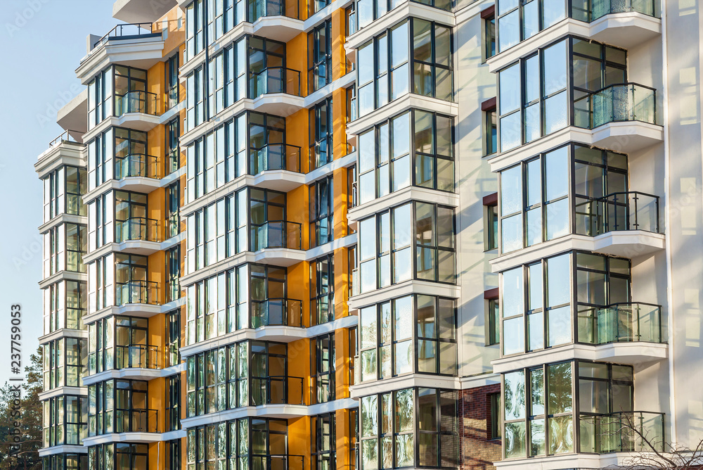 Fototapeta premium facade of the house with glass balconies