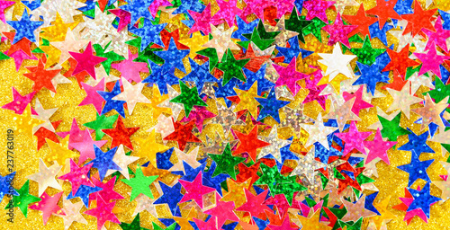 Beautiful Golden festive background. Shiny with stars abstract for weddings, birthdays, Christmas