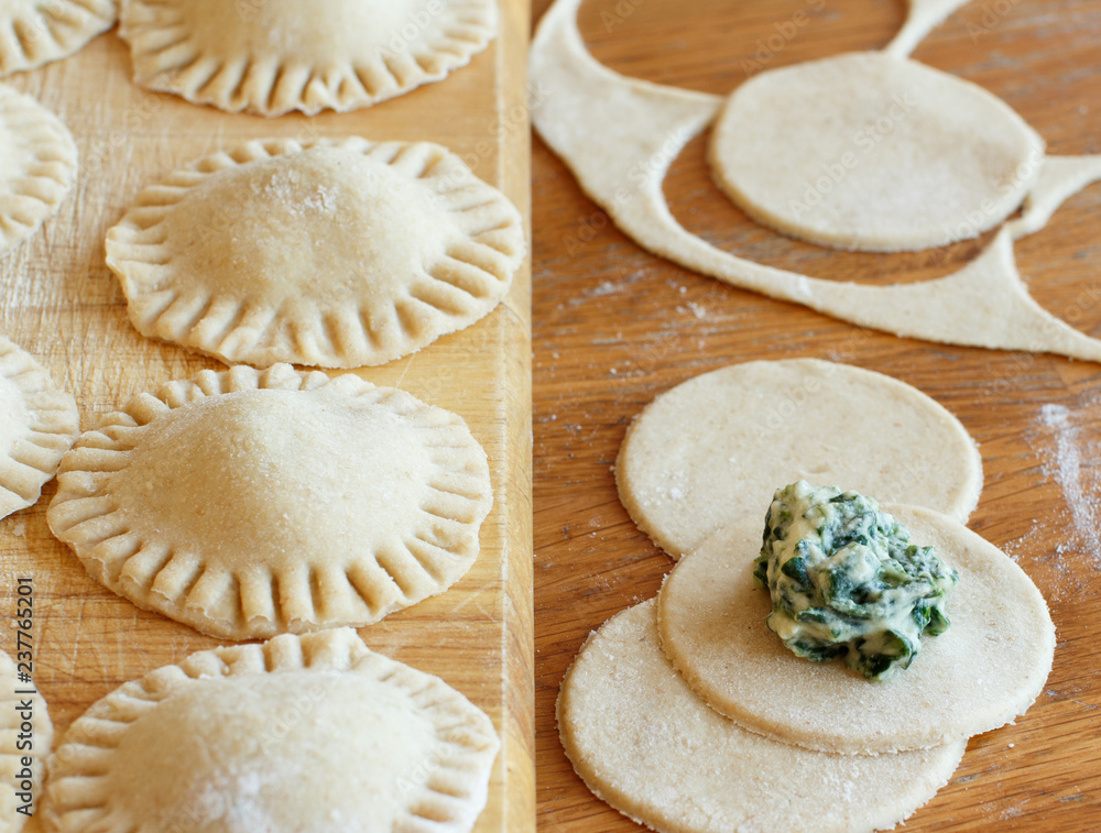 Making ravioli with ricotta cheese and spinach Making ravioli with ricotta cheese and spinach