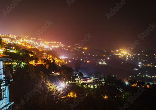 happy new year 2021 Breathtaking dawn, beauty of mountains Mussoorie uttrakhand   in india, wallpaper scenery  in night photo